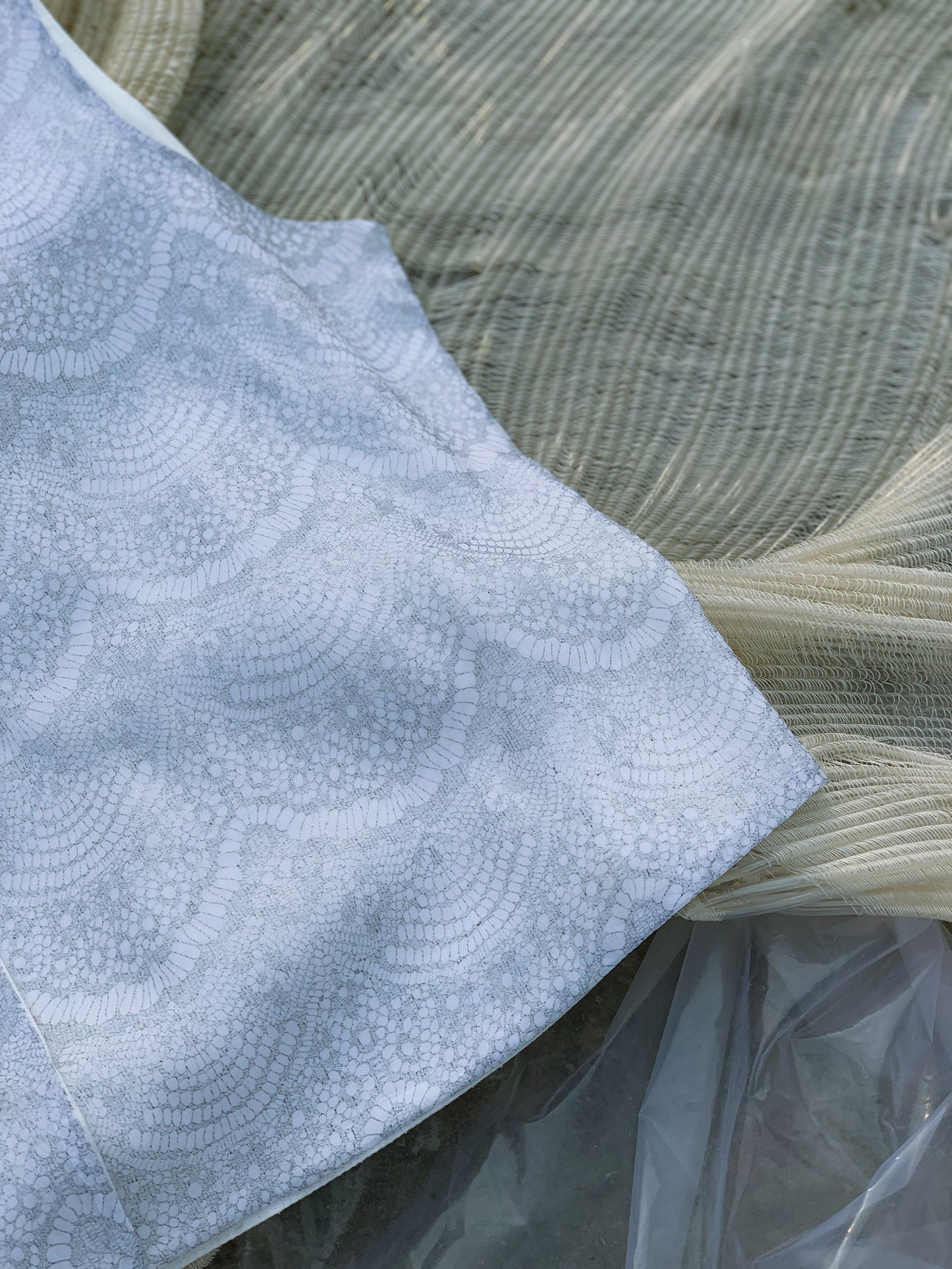 winter clothing-vest-white colour-zoom in- fabric